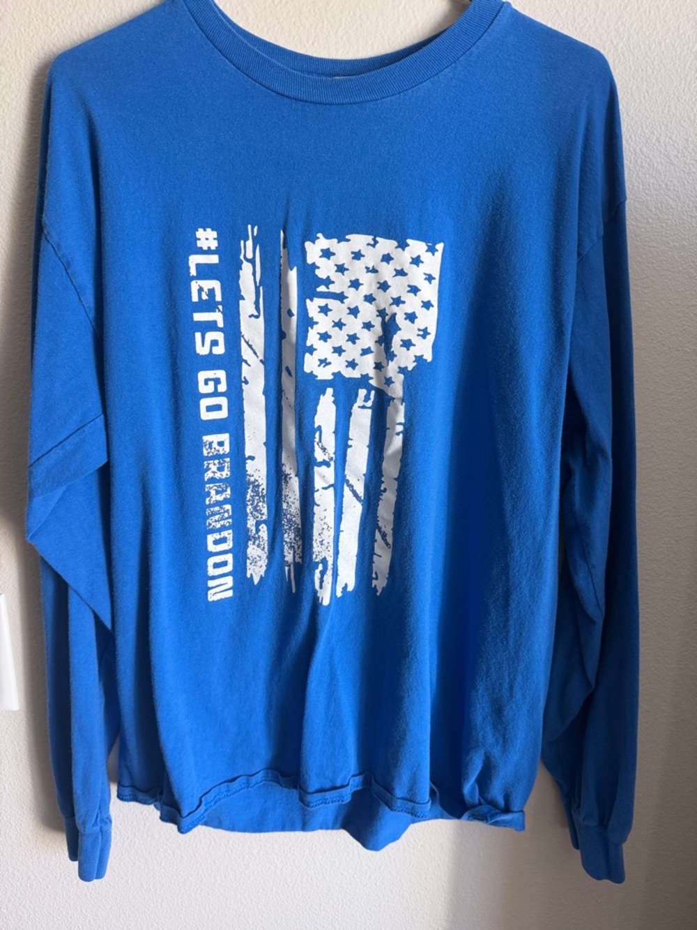 Blue Long Sleeve Graphic Tee with White Flag Print